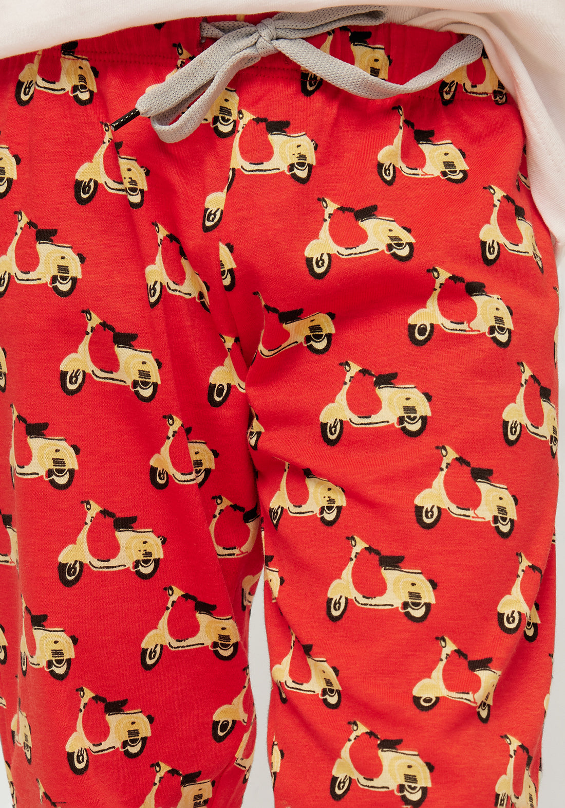 RED, YELLOW AND BLACK SCOOTER PRINT KNITTED PANTS