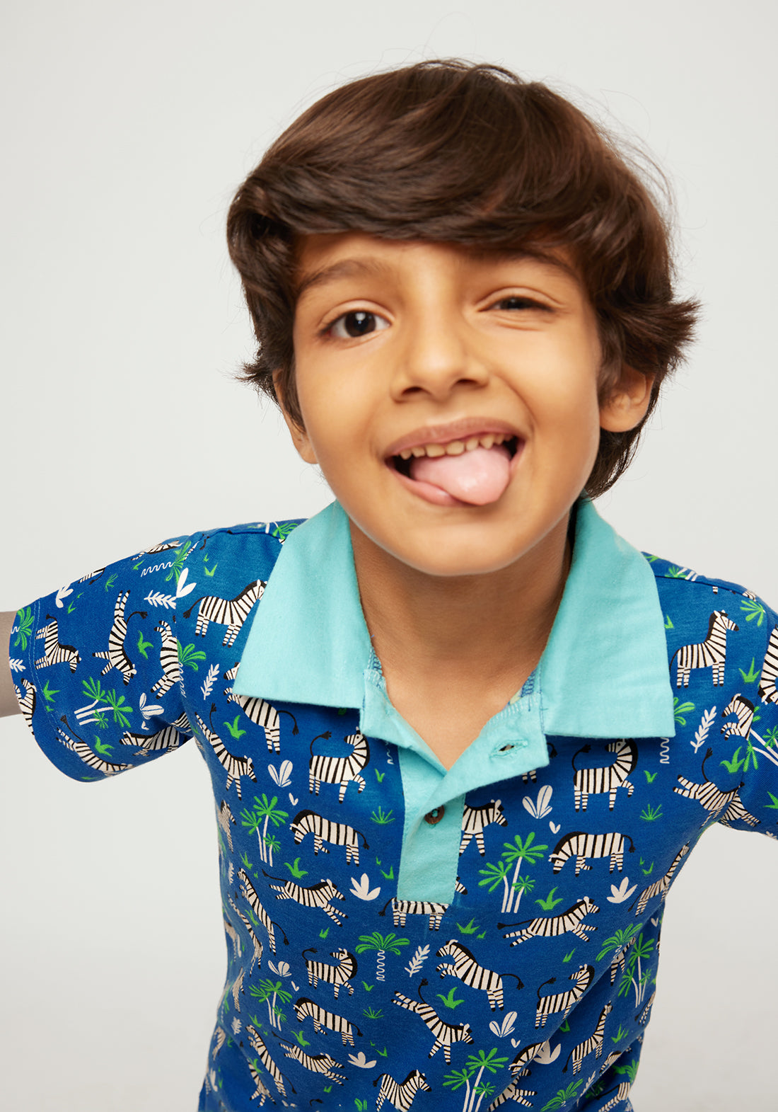 BLUE, BLACK AND WHITE ZEBRA PRINT POLO T-SHIRT