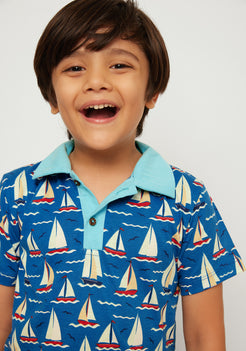 RED, BLUE AND WHITE BOAT PRINT POLO T-SHIRT